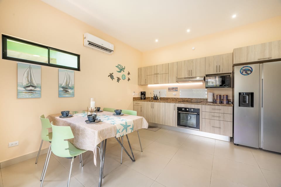 Open concept living room, dining room, kitchen