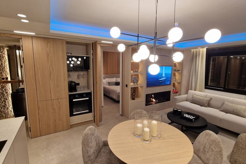 Experience a fluid, modern home where everything is connected. Cook, dine, and relax in a bright, open-plan space. Sophisticated design, ambient lighting, and comfort combine for a contemporary, elegant, and functional lifestyle.