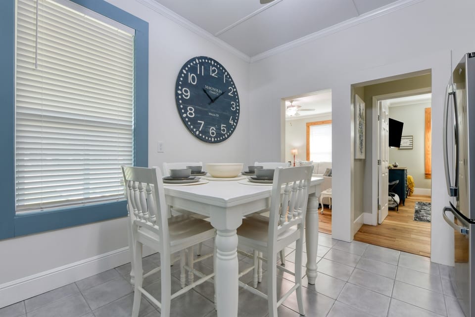 Kitchen leads into the living room and down both hallways to the bedrooms