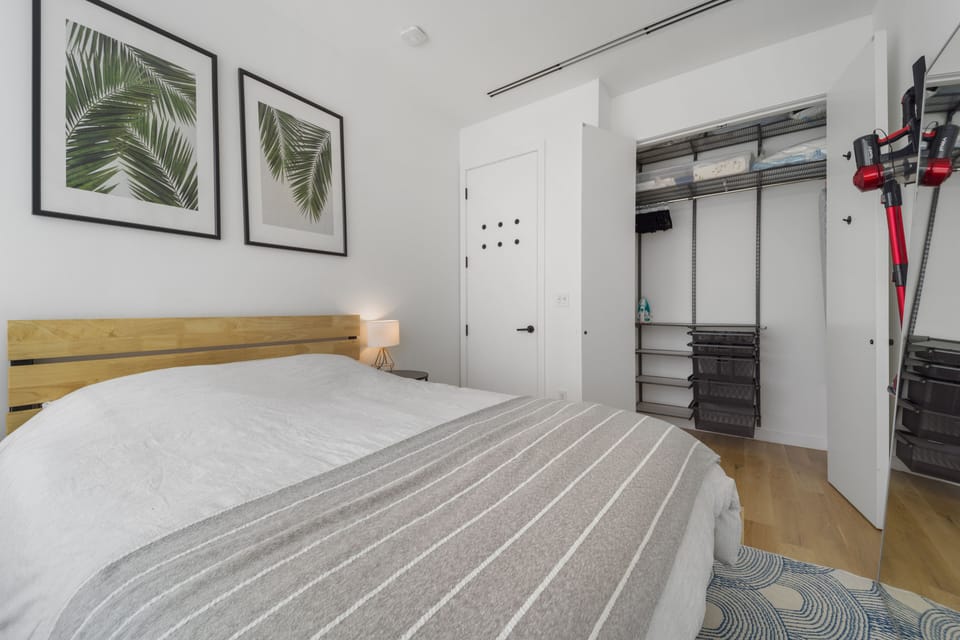 Queen sized bed with large closet space.