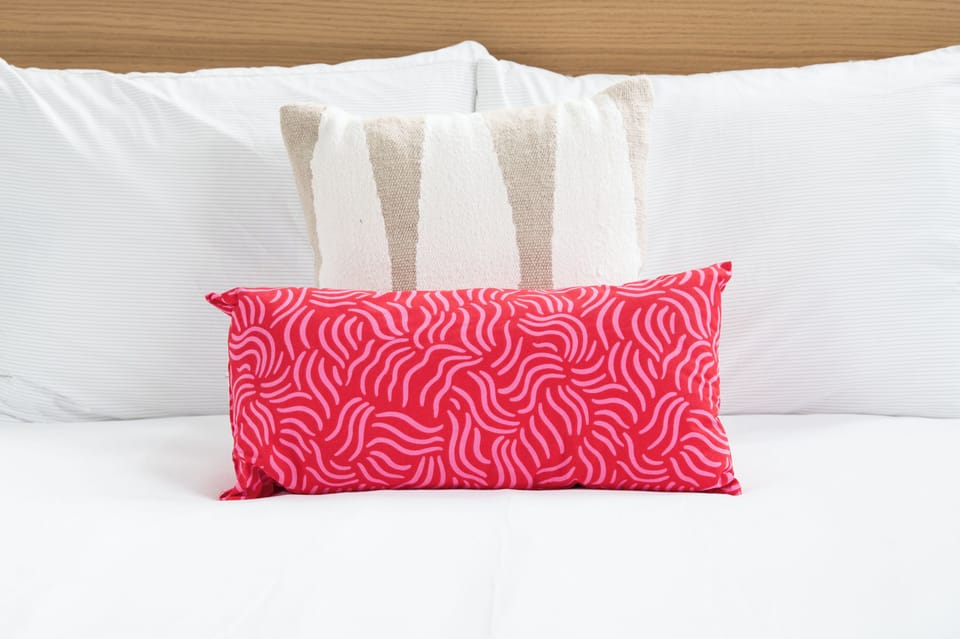 Soft bedding, fresh linens, and thoughtful details for a peaceful stay.