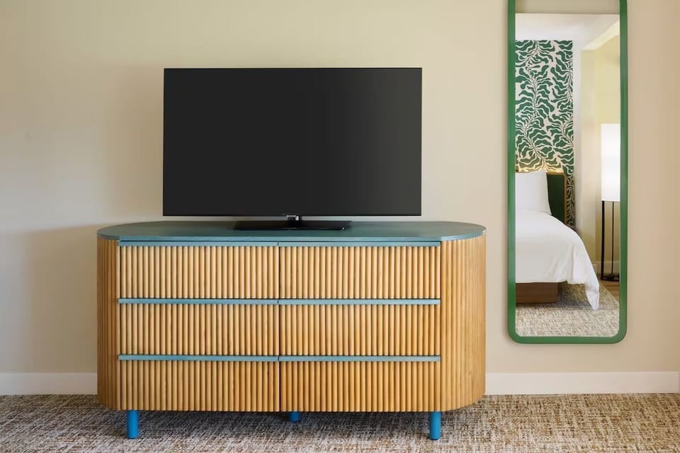 Feel at home with generous storage and easy in-room entertainment.