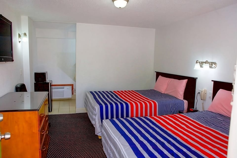 Unwind in a cozy twin room with fresh linens