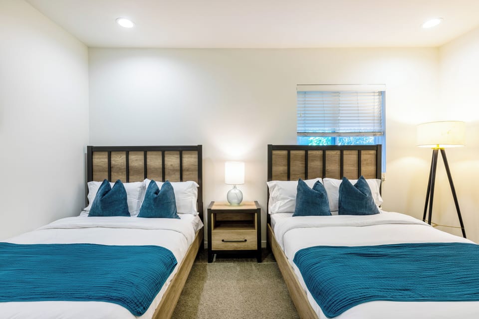 Carpeted floors keep the room quiet and cozy for a peaceful night's rest.