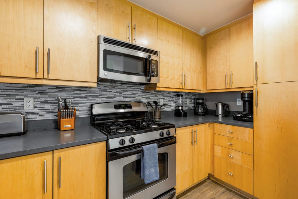 Heat up quick snacks or leftovers in the convenient overhead microwave.

