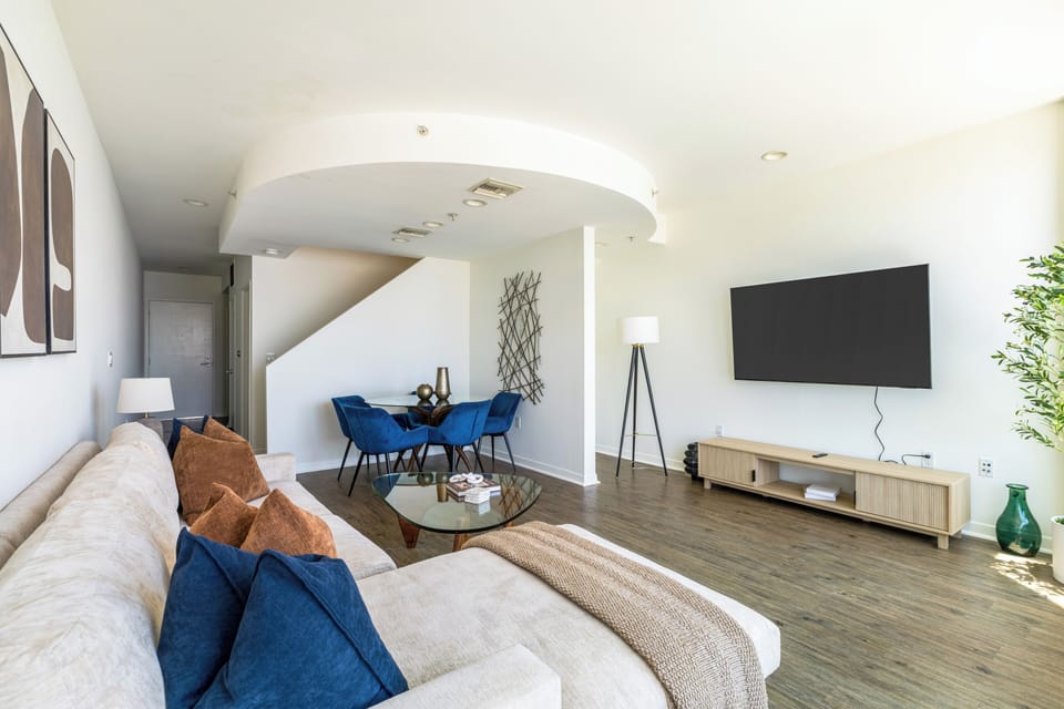 Flow seamlessly from the living room to this chic open-concept dining spot.