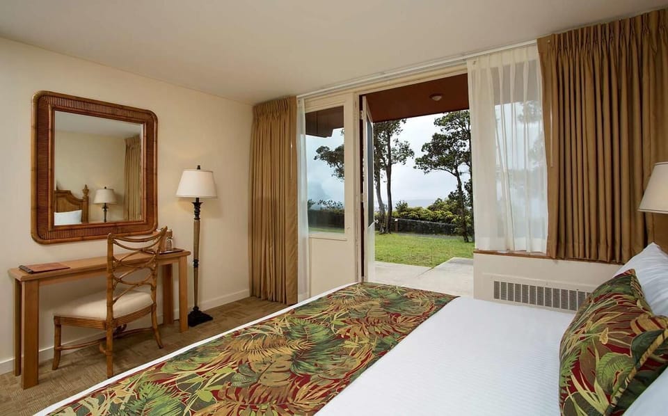 Step outside from bed and savor breezy garden views.