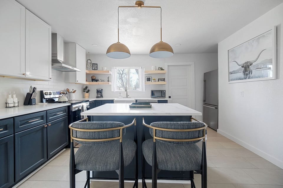 Bright modern kitchen with island seating and stylish designer finishes