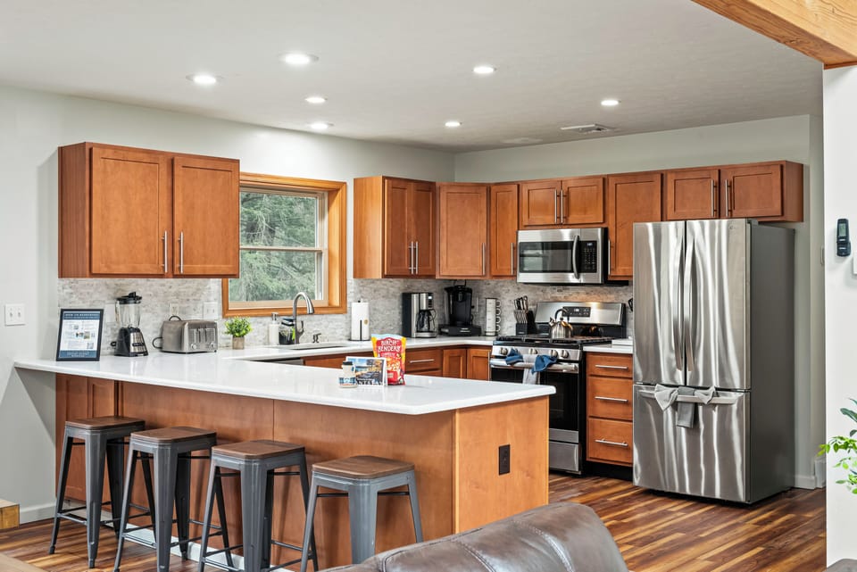 Fully equipped with stainless steel appliances.