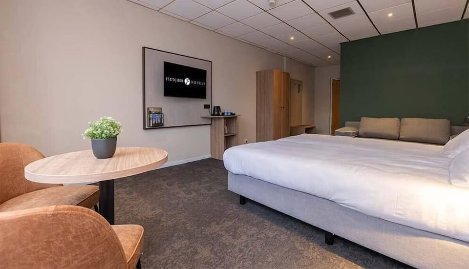 Unit with 2 Twin beds and 1 sofa bed. Exact unit will be assigned upon arrival. Views, colors, and decor may vary.