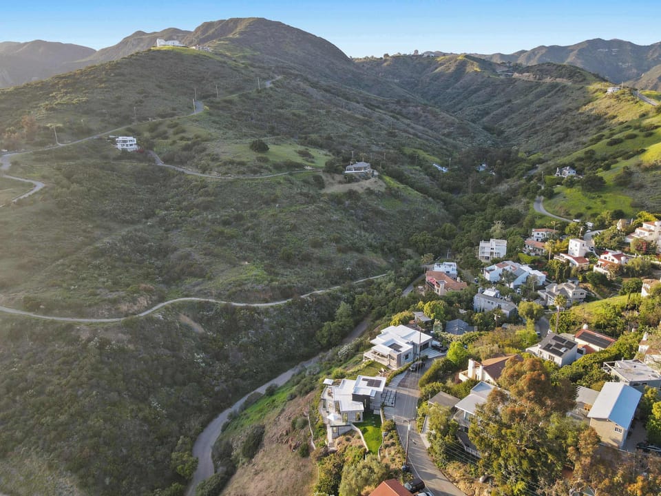 Find your place tucked between sea, sky, and hillside.