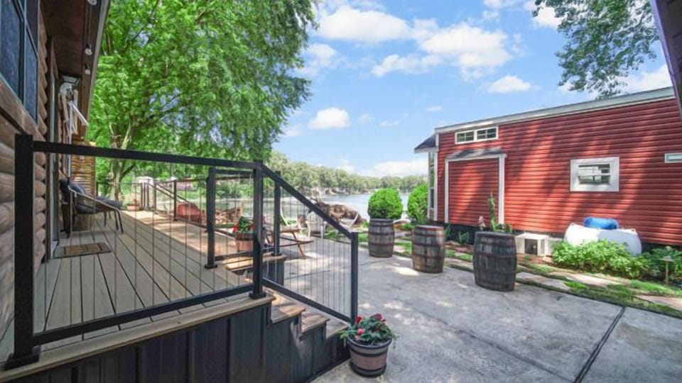 Gorgeous view of lake with plenty of seating for relaxation with friends & family