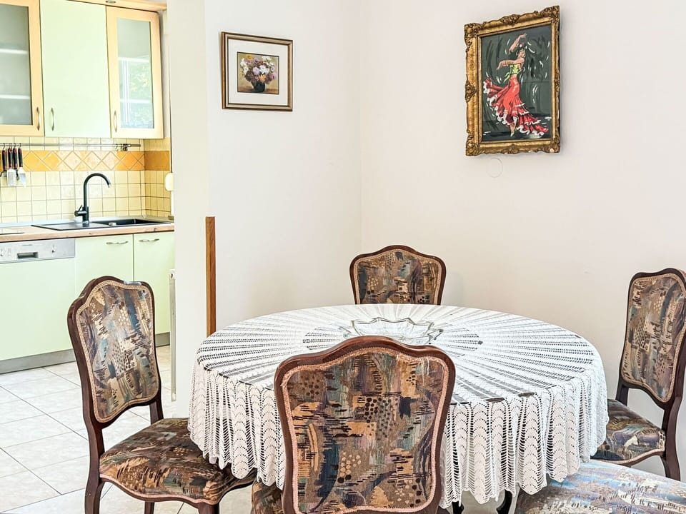 Furniture, Interior Design, Flooring, Wood, Floor, Table, Textile, Room, Lighting, Chair