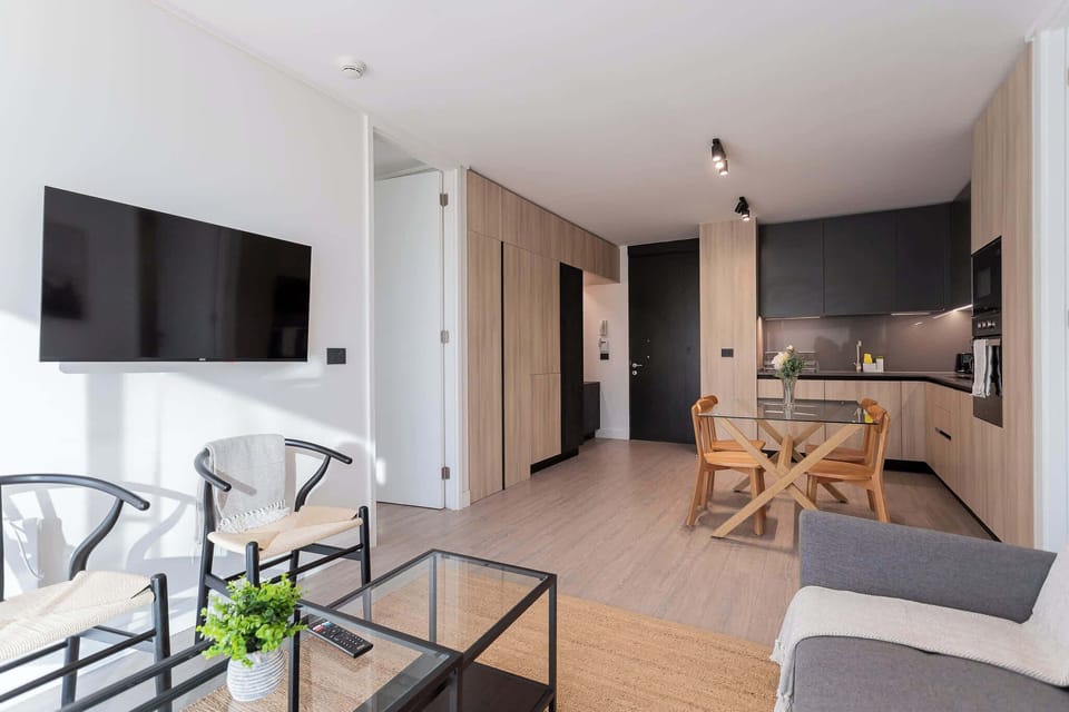 Experience modern living in this stylish space, featuring an open layout, sleek furniture, and a cozy atmosphere perfect for relaxation.