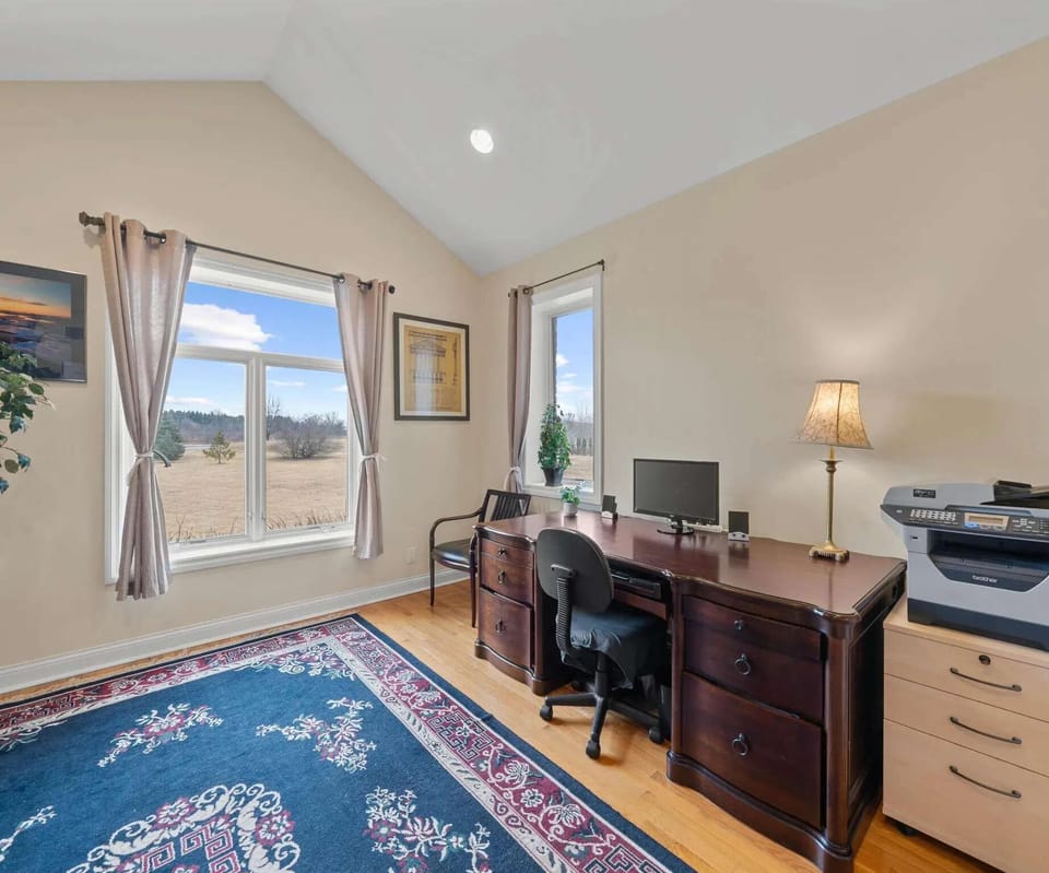 Bright and inviting home office with stunning views, ideal for productivity!