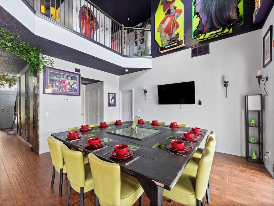 Welcome to the Villains Village House - a bold and colorful kitchen and dining space where iconic mischief meets modern comfort!