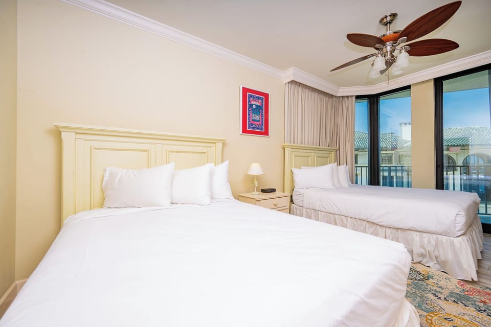 Relax on one of the cozy queen beds in this guest suite and enjoy a peaceful slumber