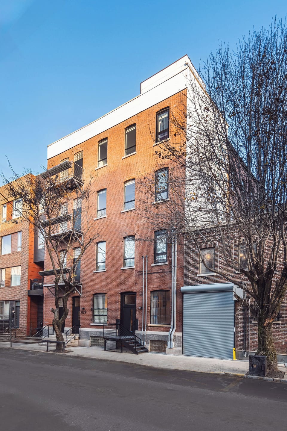 15 unit building of large lofts, with gym, courtyard, and fountain.