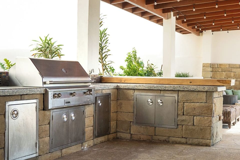 Outdoor bbq with rotisserie and smoker