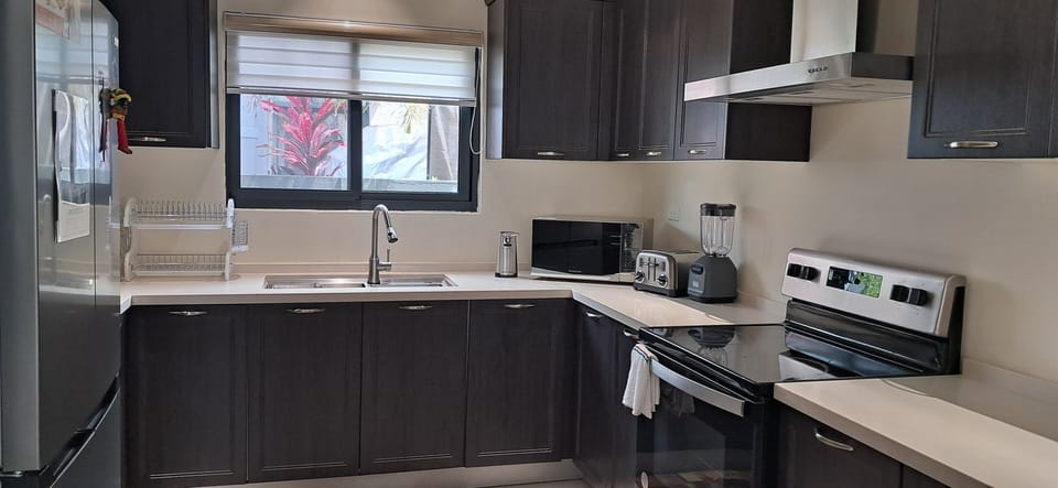 Spacious kitchen with all the essentials to prepare meals and create memories.