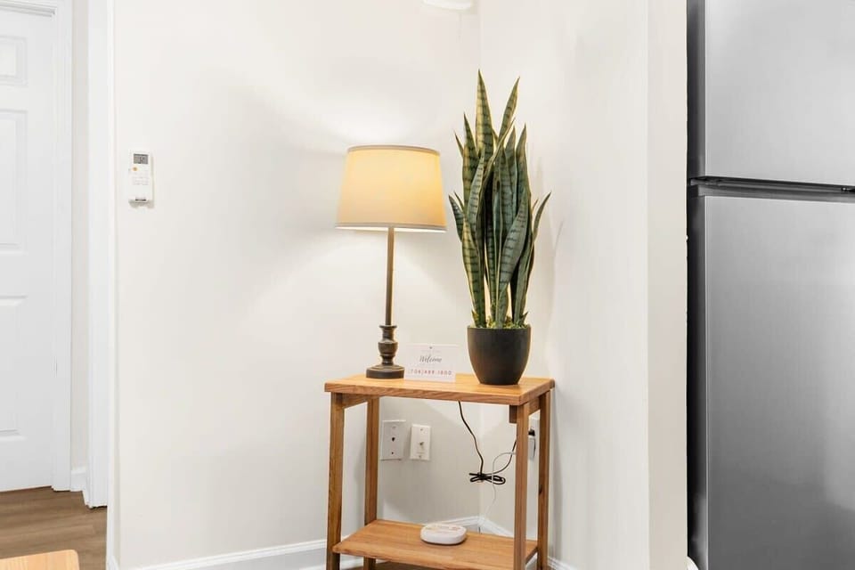 Cute corner with lamp and plant