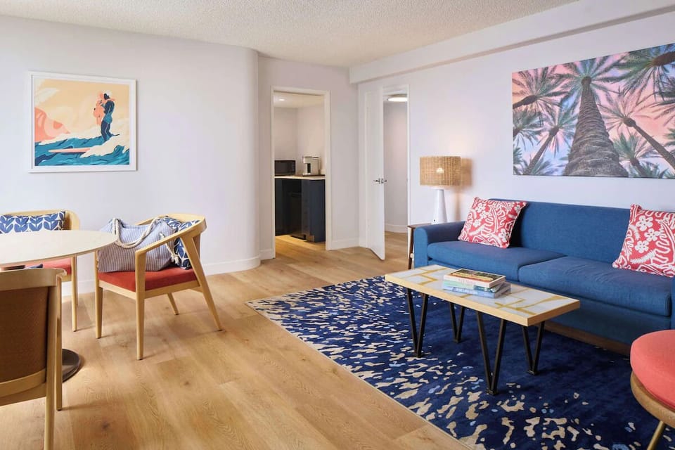 Stretch out on the sofa in a bright, airy living area.