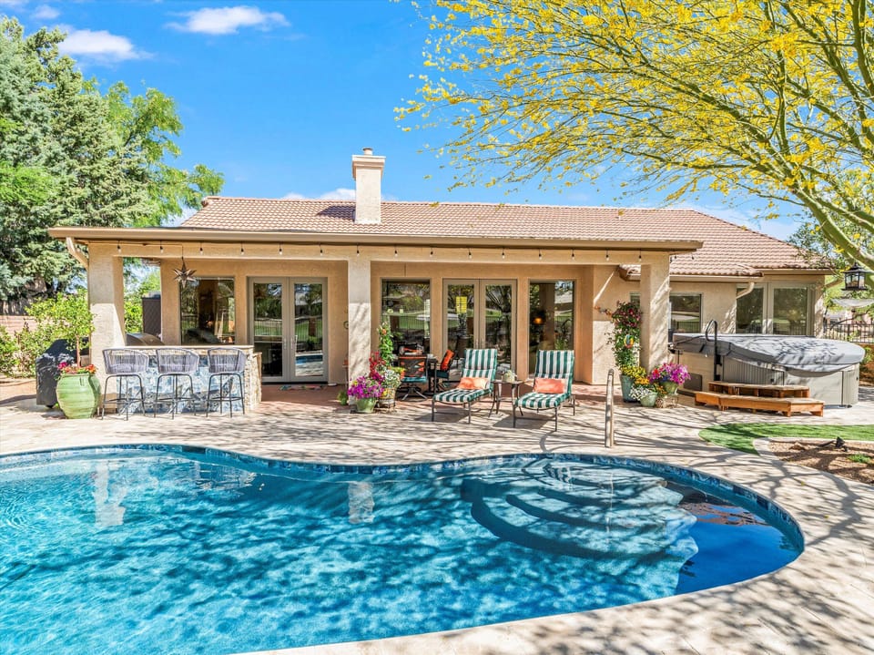 Salt water solar heated pool and outdoor bar/kitchenette.