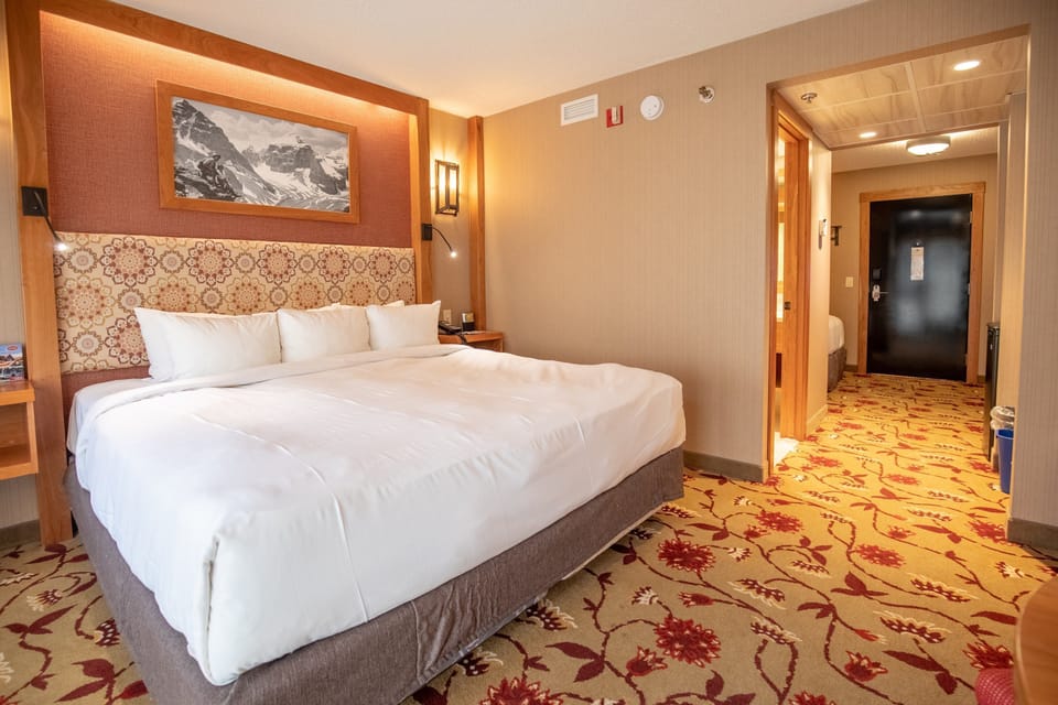 This welcoming King bed is perfect for enjoying an evening film before you doze off.