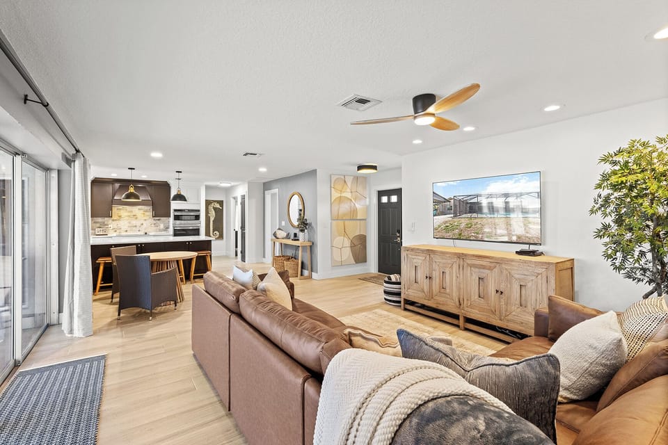 Open layout with lots of seating. All overlooking screened in pool.