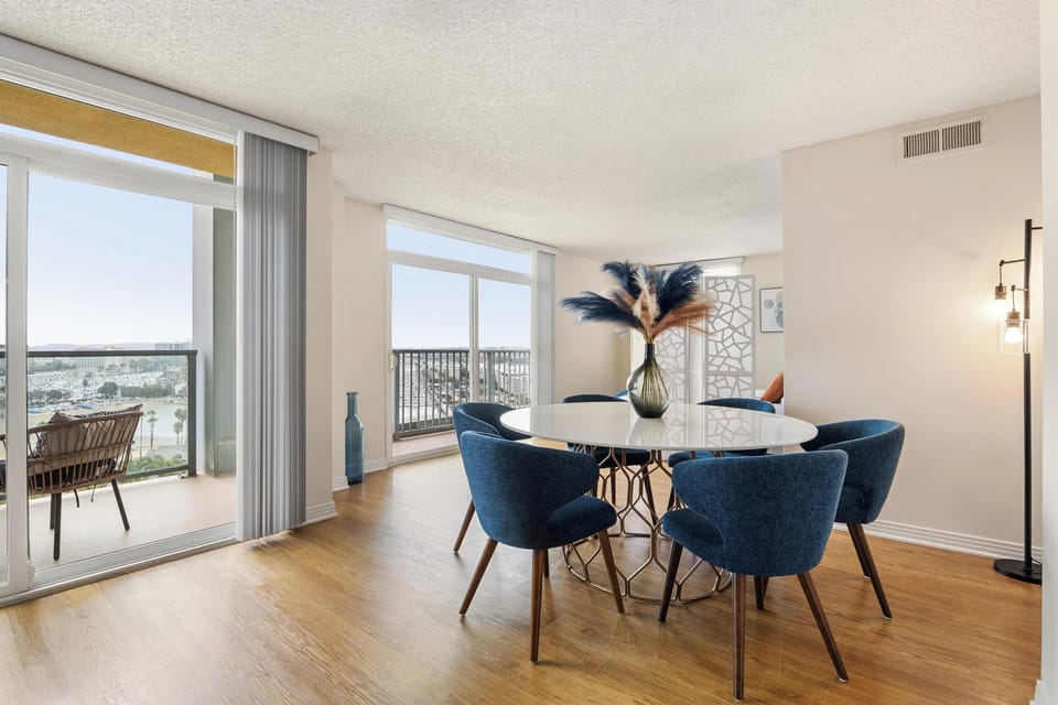 Dining Area with View - Dine in style with sweeping balcony views