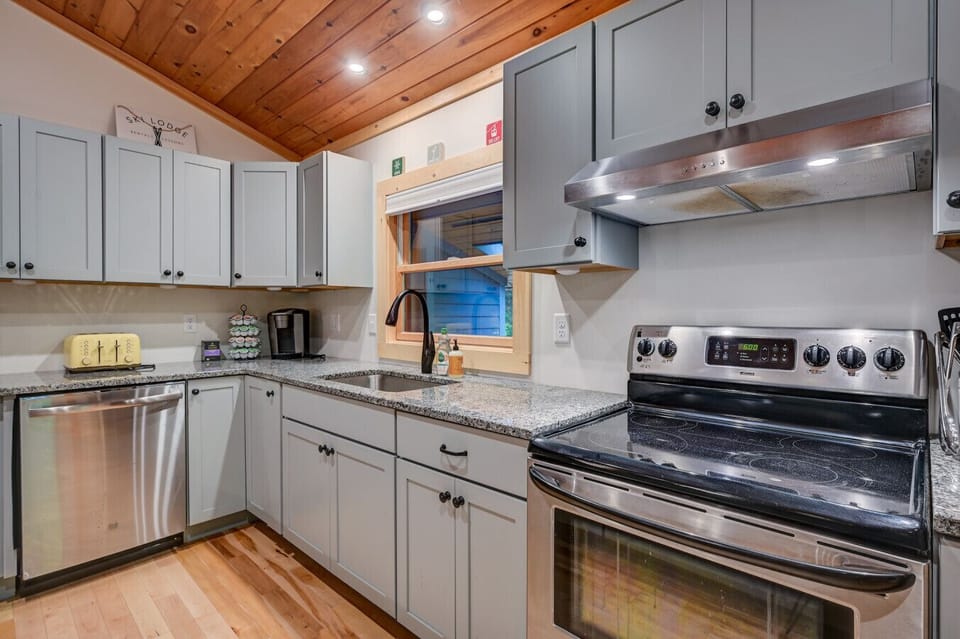 Stocked kitchen with modern appliances, perfect for cooking up a delicious homemade meal.