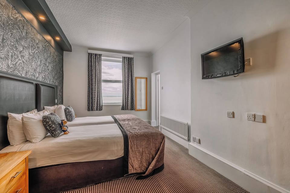 Relax with evening entertainment from bed in calm, quiet comfort.