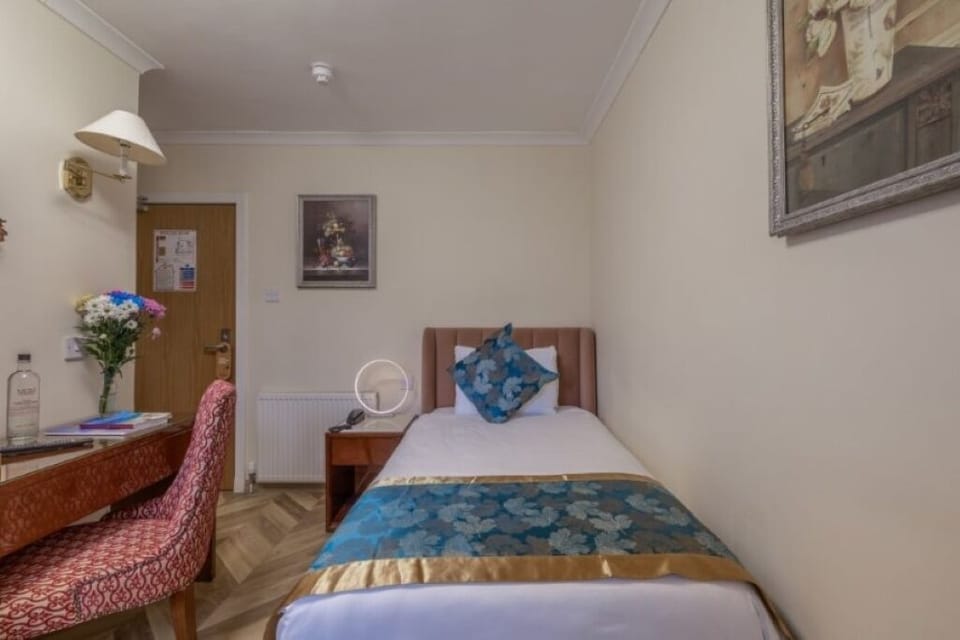 Drift off in a snug single bed after a busy day.