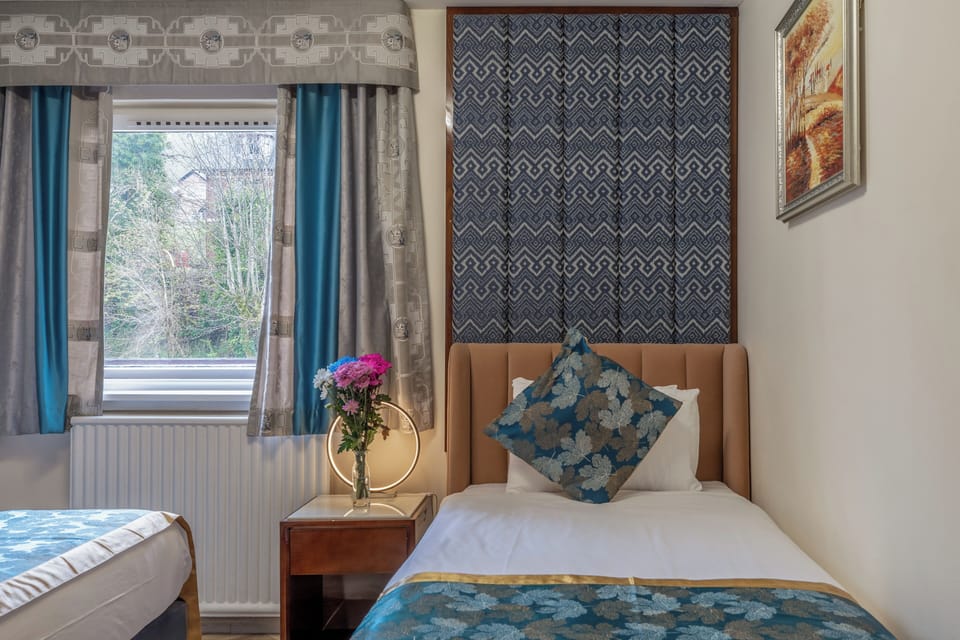 Drift off in a cozy single bed with soothing décor.