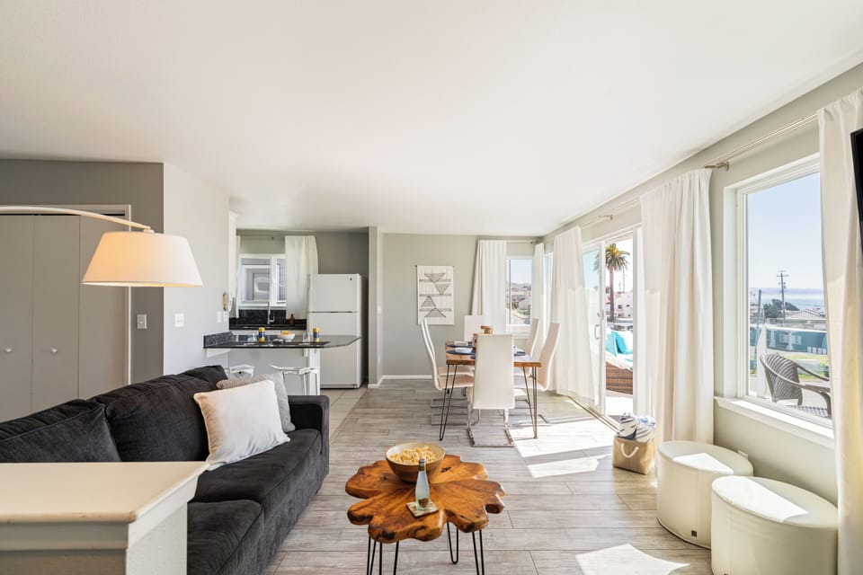 Seamless transition from kitchen to living room, perfect for entertaining. (Cayucan Bungalow 224)