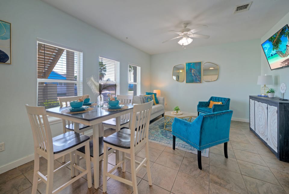 A cheerful dining space for sharing meals between Port Aransas adventures.