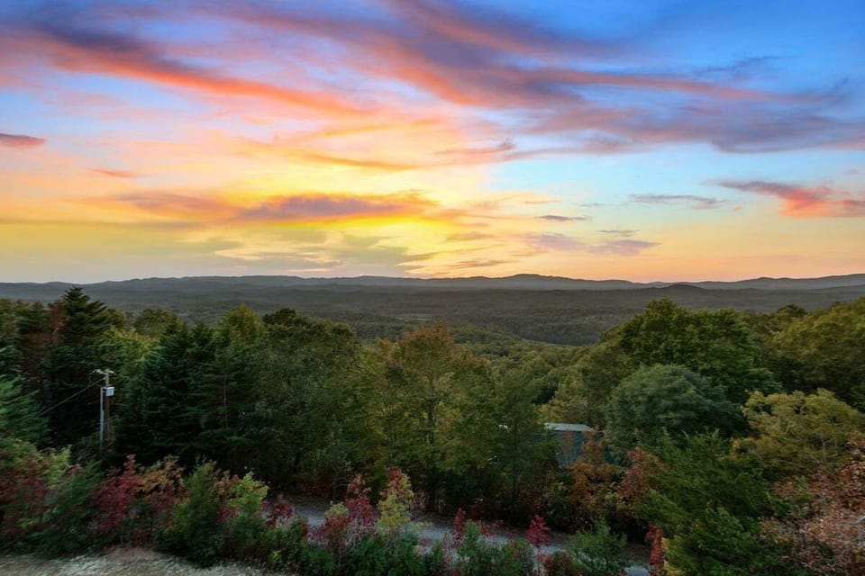 This is the view from our front deck.  Not a drone photo.  We sit above those the trees.
