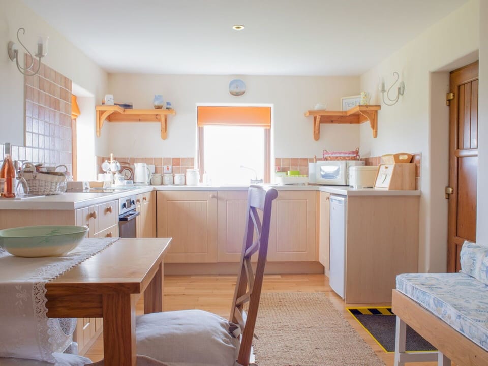 Furniture, Flooring, Wood, Interior Design, Floor, Cabinetry, Kitchen, Lighting, Room, Ceiling