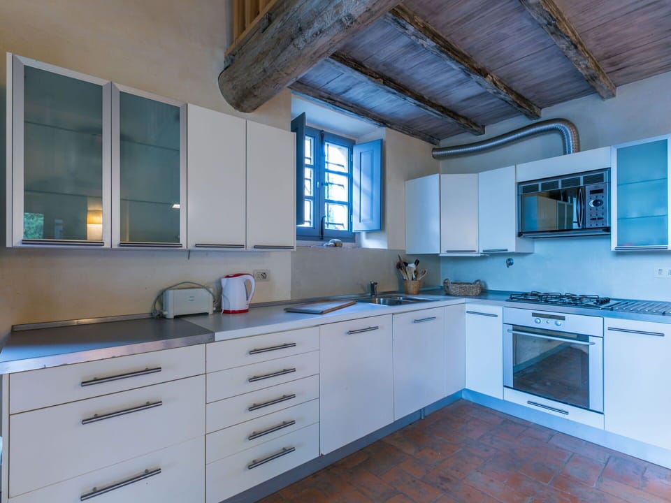 Kitchen, Countertop, Kitchen Appliance, Flooring, Interior Design, Plumbing Fixture, Sink, Kitchen Sink, Major Appliance, Cabinetry