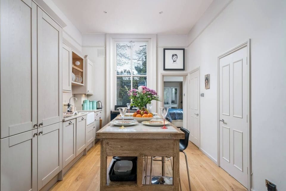 This intimate setting offers a warm and inviting atmosphere, where you can gather with your loved ones and enjoy a delicious meal. What makes it even more special is the breathtaking view just outside the window.