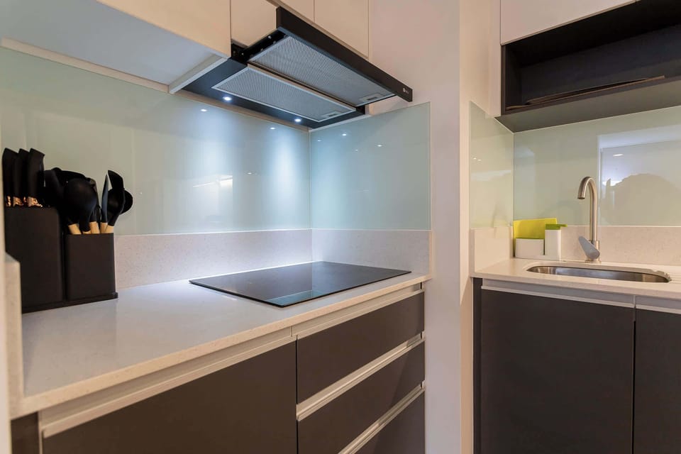 Experience a sleek, modern kitchen equipped with everything you need for a delightful cooking experience during your stay.