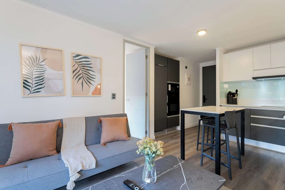 Chic and cozy studio with modern kitchen and stylish decor, perfect for a relaxing stay in the heart of the city.