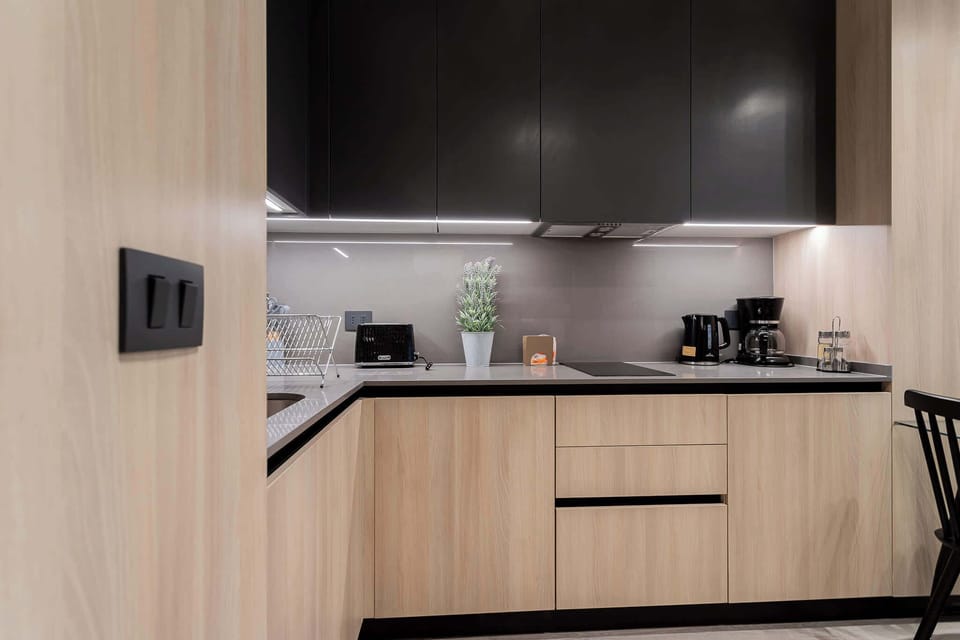 Sleek and modern kitchen equipped for culinary adventures. Enjoy cooking with top-notch appliances and stylish design.
