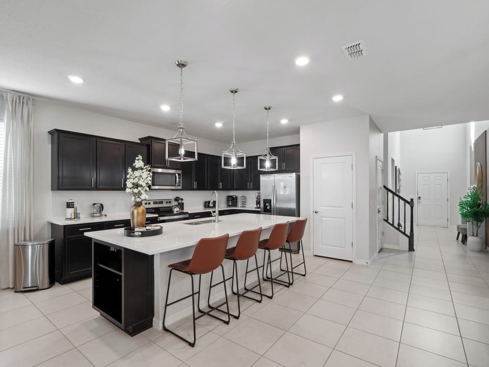 Gorgeous Full Size Kitchen with Basic Starter Essentials and Bar Stool Seating
