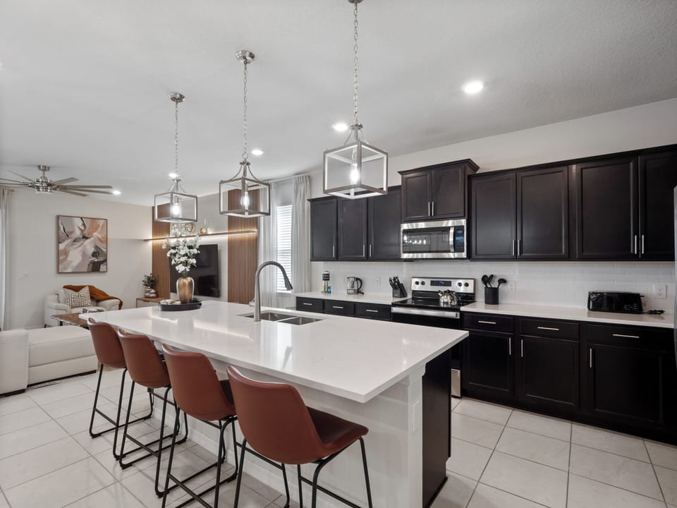 Gorgeous Full Size Kitchen with Basic Starter Essentials and Bar Stool Seating