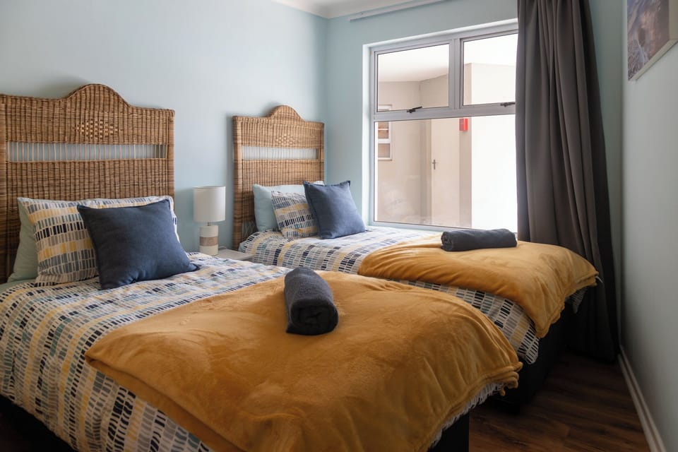 Second bedroom which can be made up with either 2 single beds or one king bed