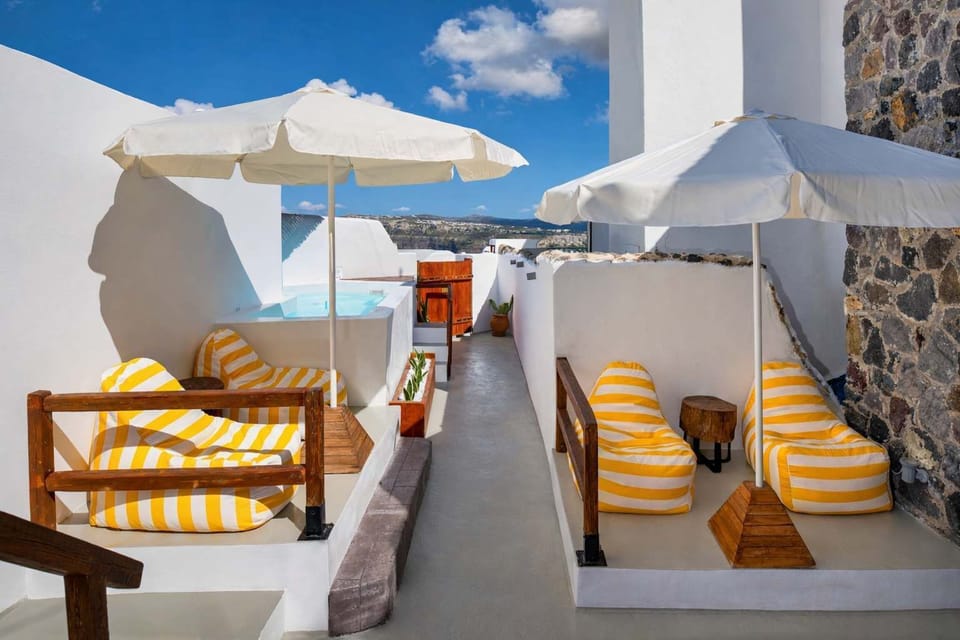 Cozy shared lounge area with shaded seating and sunny spots.