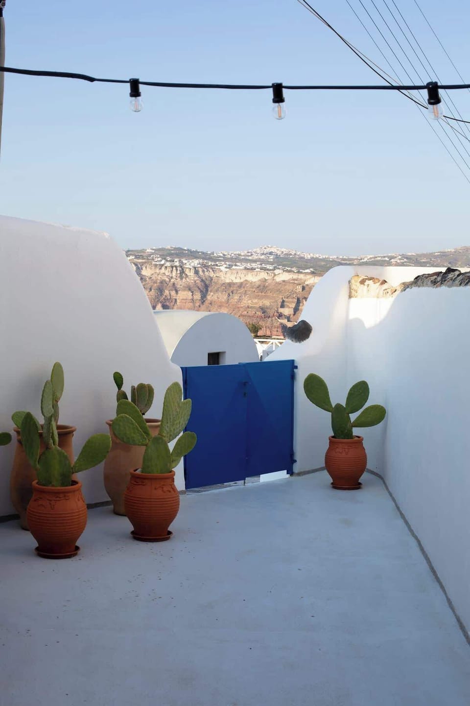 Entrance View with Local Architectural Charm
View from just outside the property showcasing the inviting entrance and Cycladic design elements.
