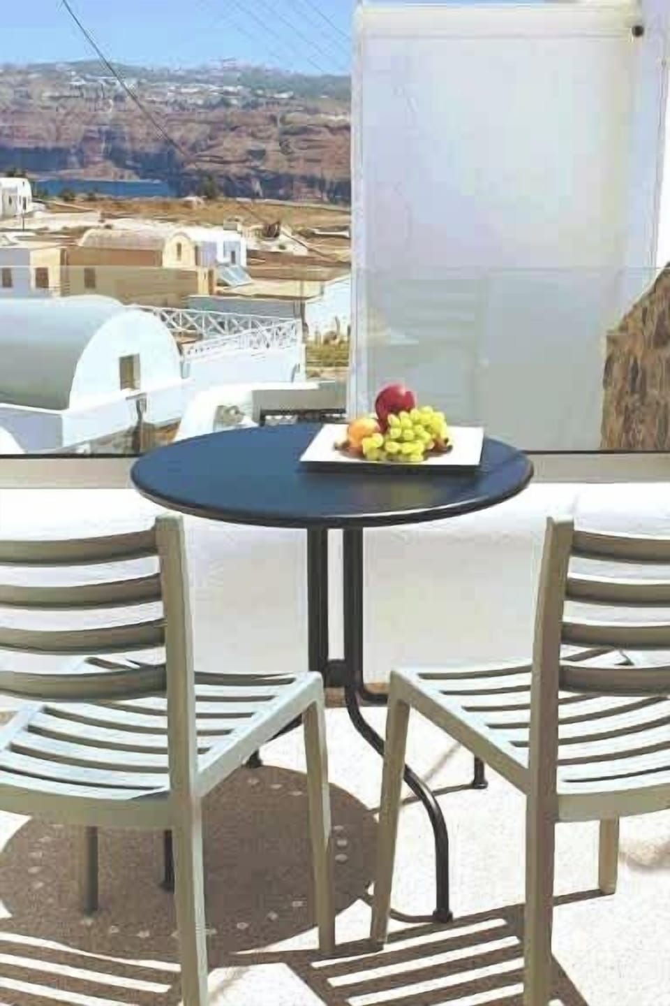 Private Veranda with Table and Chairs – Ideal for Meals or Wine Outdoors

