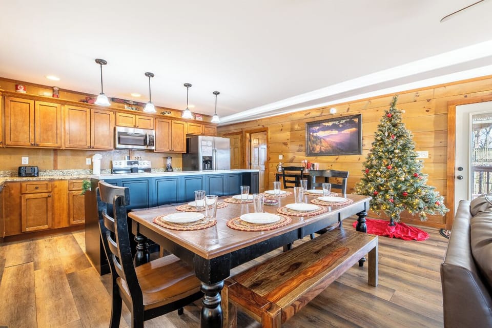 Gather around your spacious dining table in this warm, festive cabin where holiday memories are made and delicious meals shared.